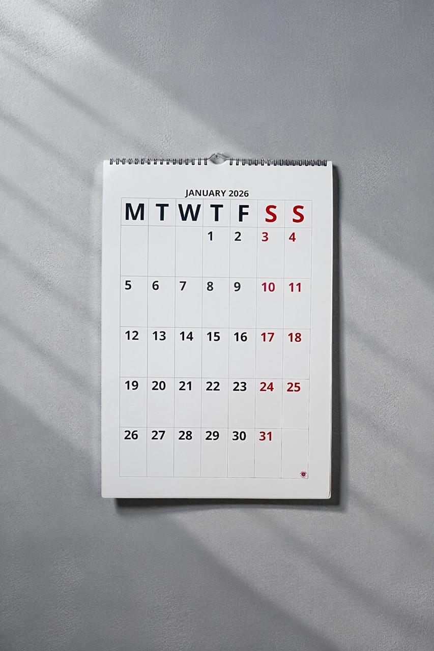 Wall calendar for January 2026 on a gray background