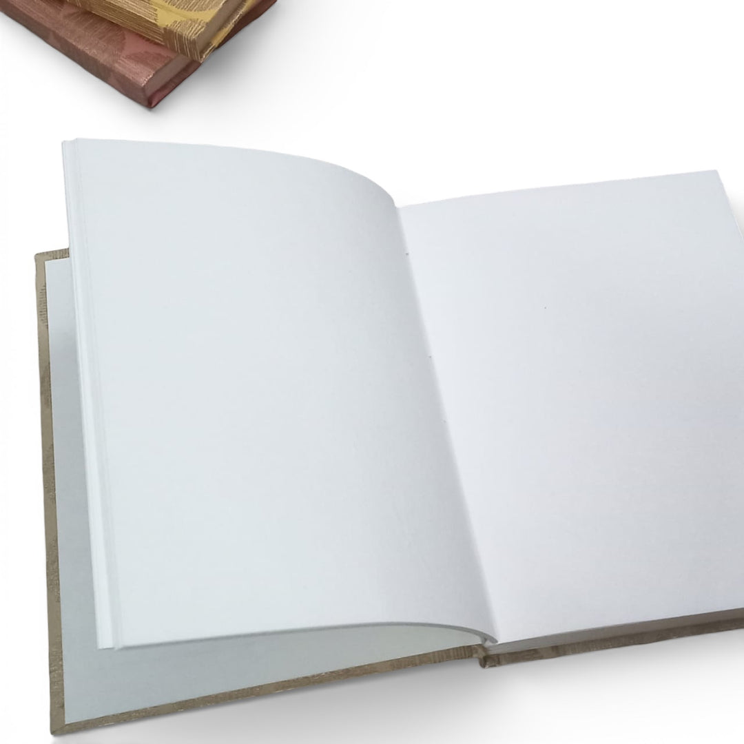 Open book with blank handmade pages on a white background