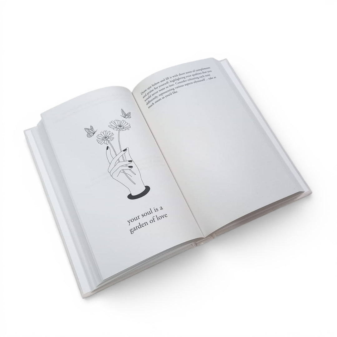 Inside pages of the journal titled 'Glimmers' by Calin Hargreaves on a white background at Gifts of Love. 