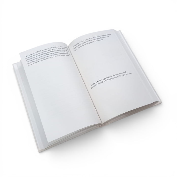 Inside pages of the journal titled 'Glimmers' by Calin Hargreaves on a white background at Gifts of Love. 
