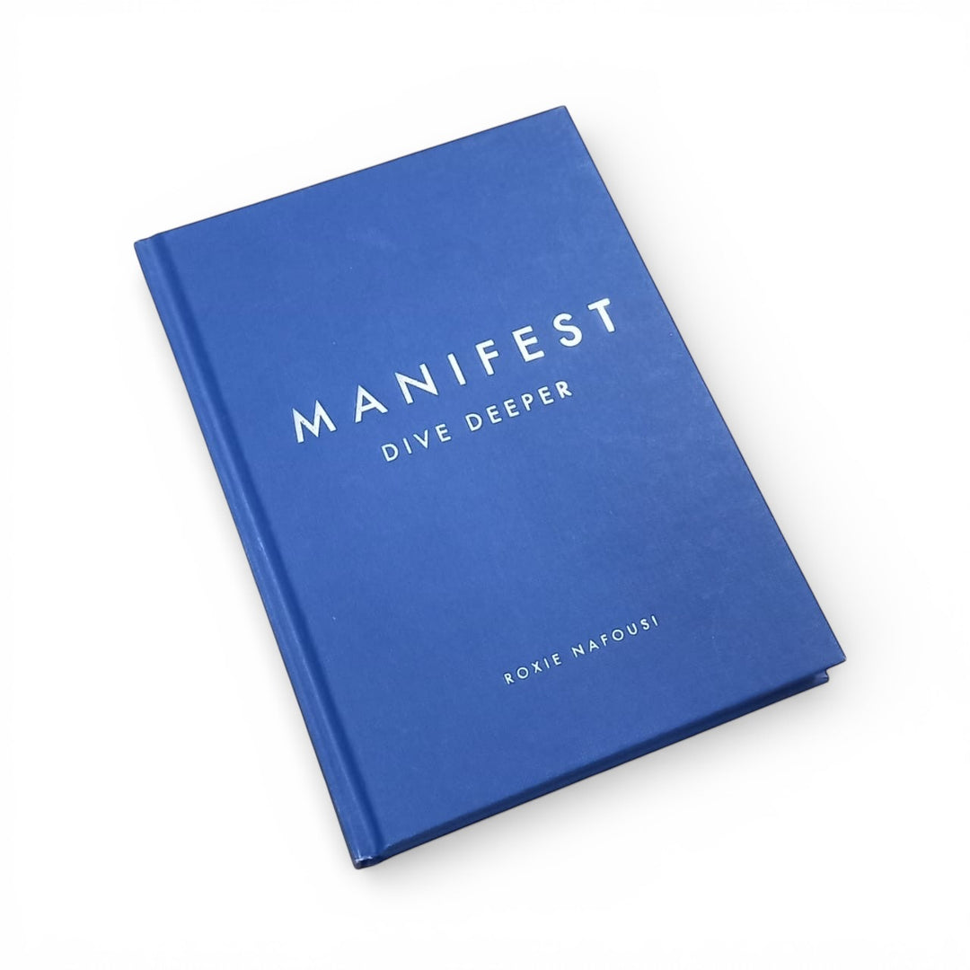 Front cover of the book titled 'Manifest Dive Deeper' by Roxie Nafousi on a white background at Gifts of Love. 