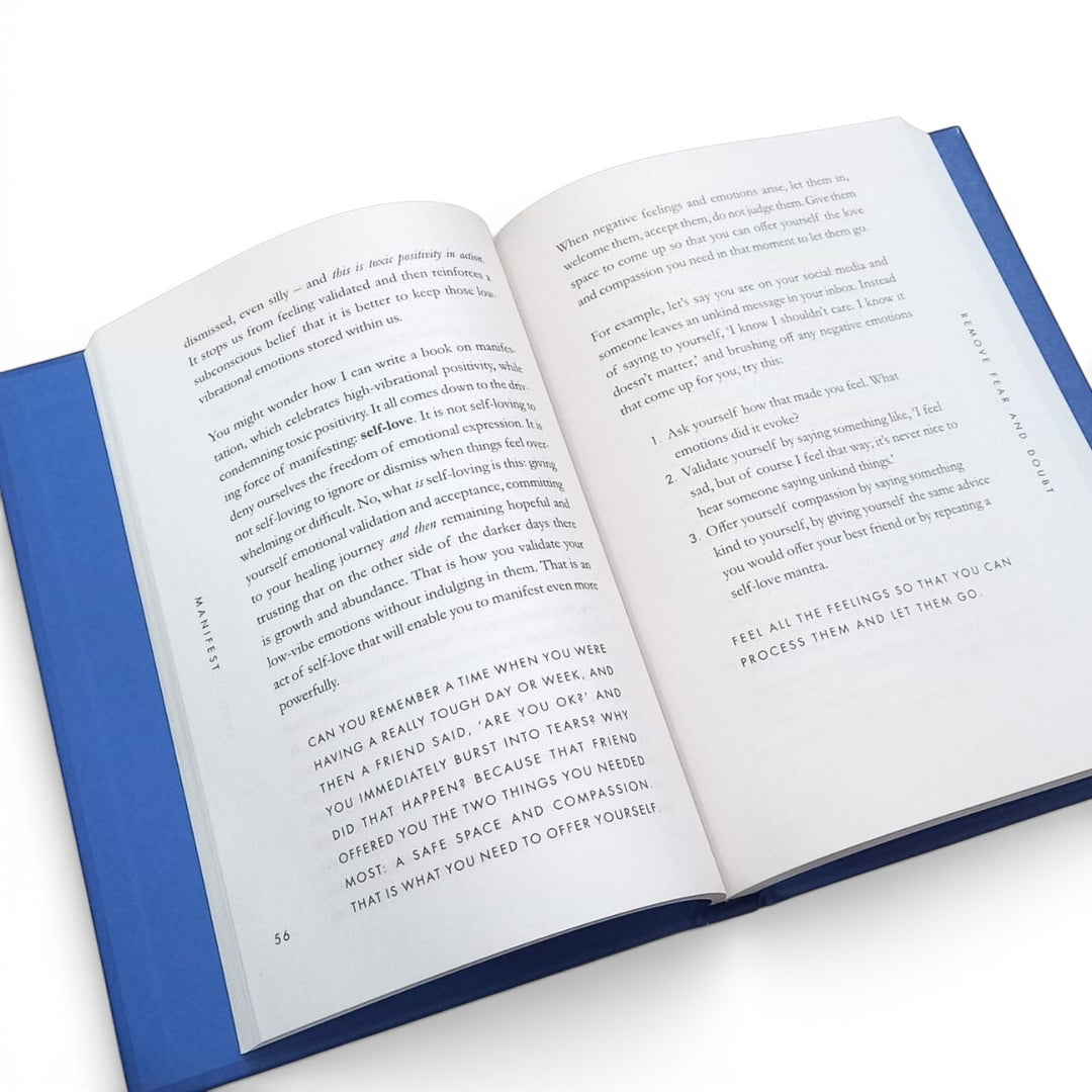 Inside pages of the book titled 'Manifest Dive Deeper' by Roxie Nafousi on a white background at Gifts of Love. 