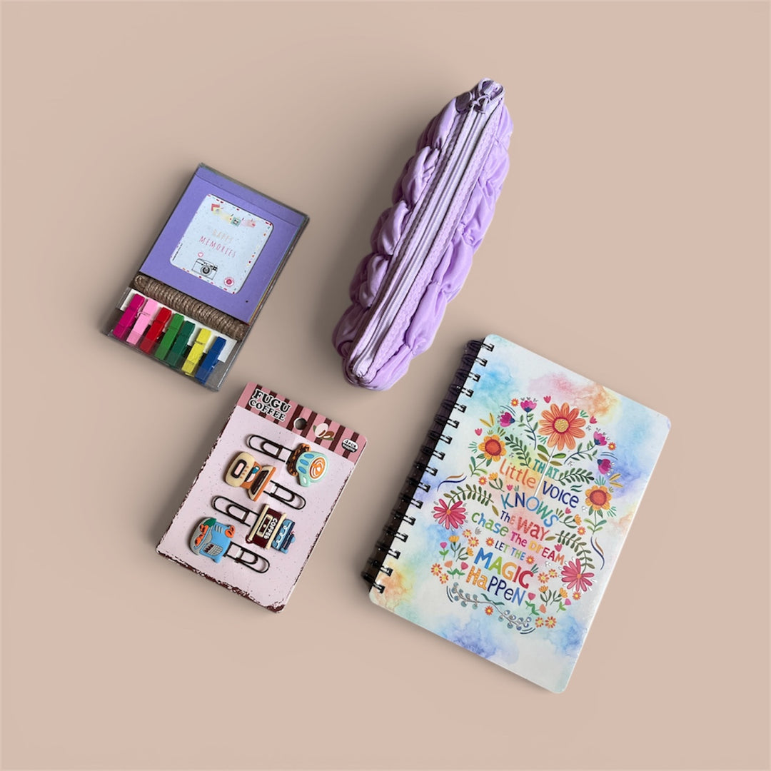 Stationery items including a spiral notebook, pencil case, photo holder with string and clips on a beige background