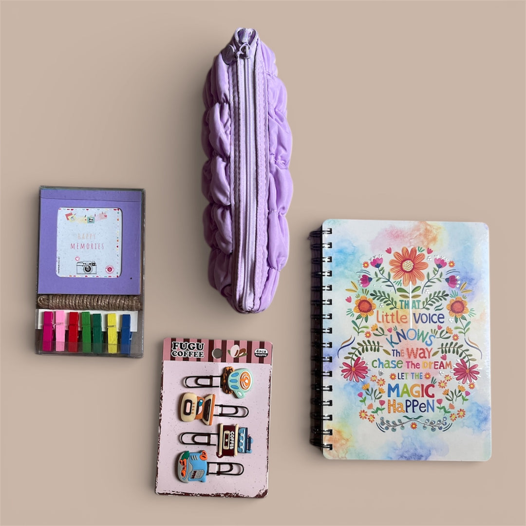 Collection of stationery items including a notebook, clips, photo holder and a pouch on a beige background