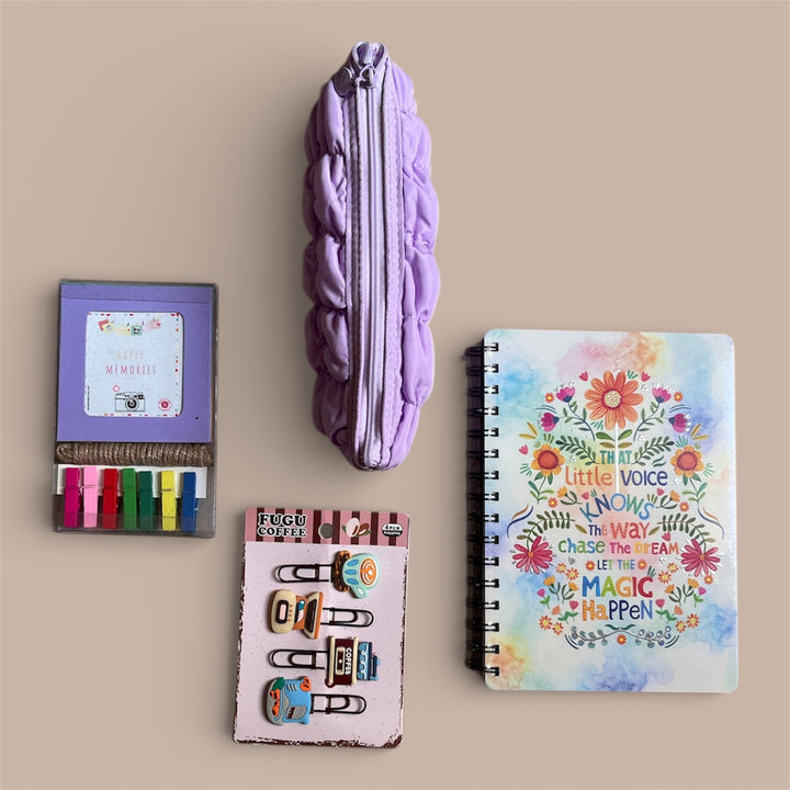 Collection of stationery items including a notebook, clips, photo holder and a pouch on a beige background