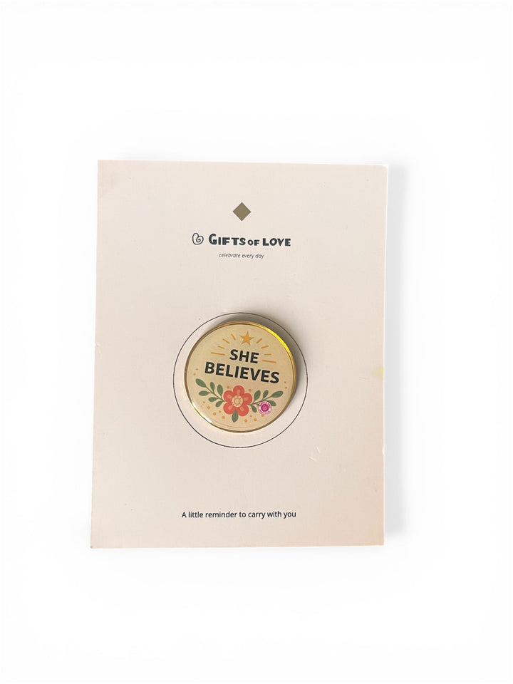Motivational badge pin on a &
